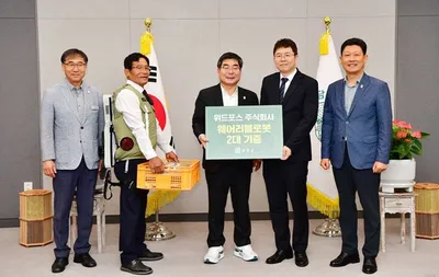 농작업 신체 부담 줄인다… 위드포스 담양군에 착용형 로봇 2대 기탁
